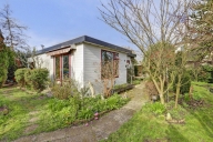 Vrijstaande recreatiewoning op eigen grond