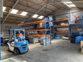 Multifunctionele bedrijfsruimte/opslagruimte (ca. 255 m²) gelegen in het buitengebied van Nieuwland, nabij Leerdam.